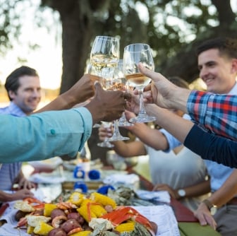 group of people cheersing