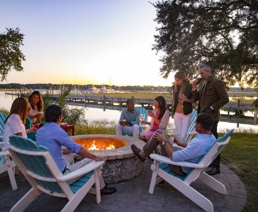 group of people around a firepit