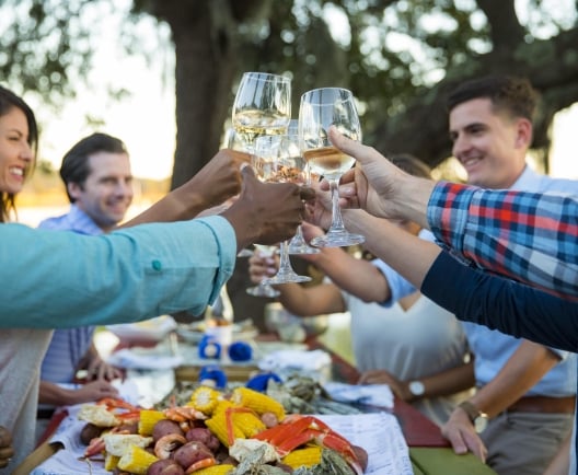 group of people cheersing