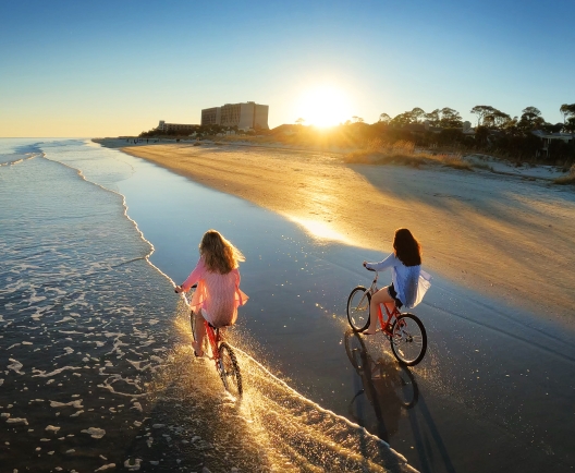 two people biking