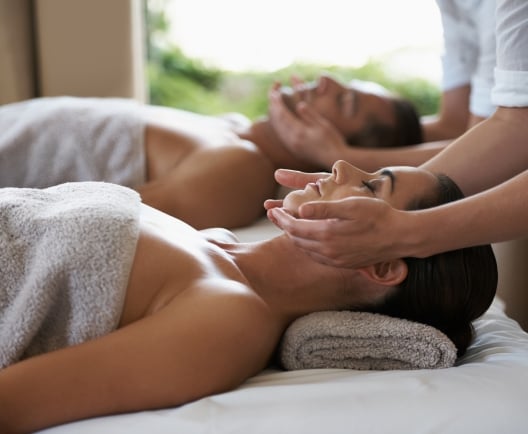 couple relaxing during a massage